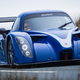 Illustration for article titled This Road Legal Monster Is Radically Faster And Cheaper Than Any Hybrid Supercar